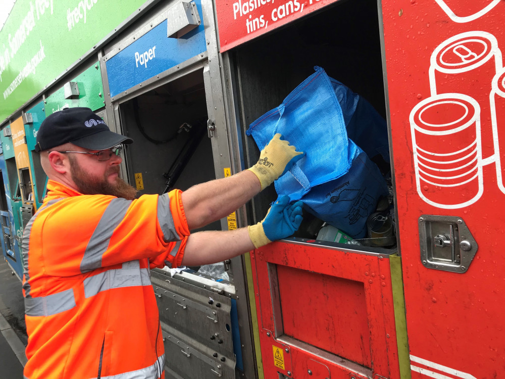 Recycling Being Loaded Into The New Suez Lorries By A Somerset Waste Partnership Employee. CREDIT: Somerset Waste Partnership. Recycling Being Loaded Into The New Suez Lorries By A Somerset Waste Partnership Employee. CREDIT: Somerset Waste Partnership.