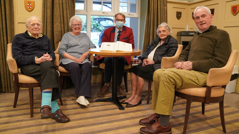 Residents (l-r) Bernard, Vera, Bet and Paul with Major General Tim Tyler (centre). Image - Royal Star & Garter.