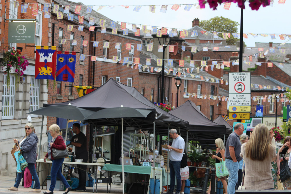 Businesses and market stalls looking bustling on Congleton's High Street. (Image - Alexander Greensmith / Congleton Nub News)