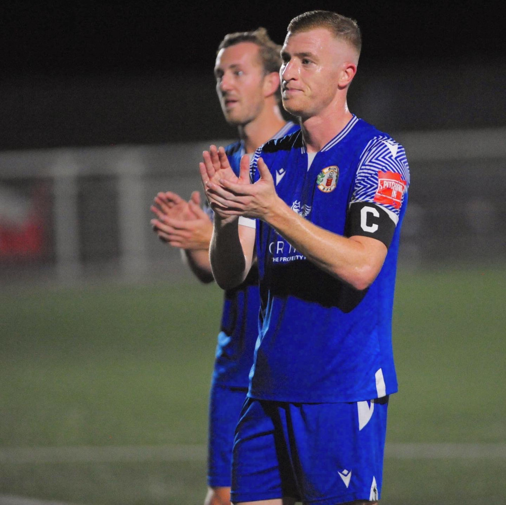 Sam Bantick applauds the fans after Grays' win. 