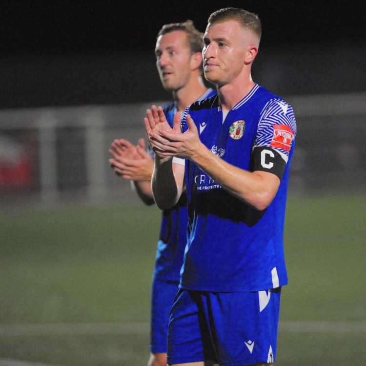 Sam Bantick applauds the fans after Grays' win. 