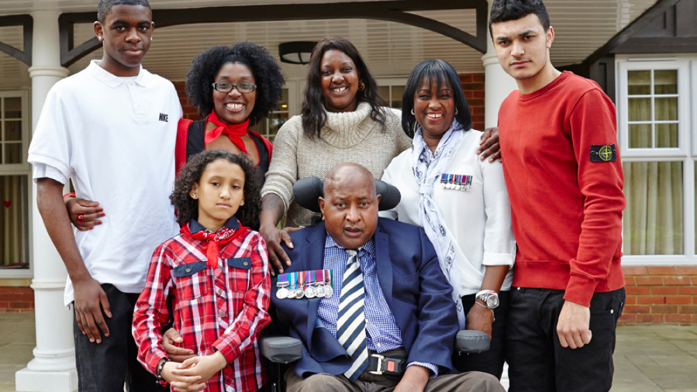 Gary Anglin, with his family outside Royal Star & Garter (Image: Royal Star & Garter). 