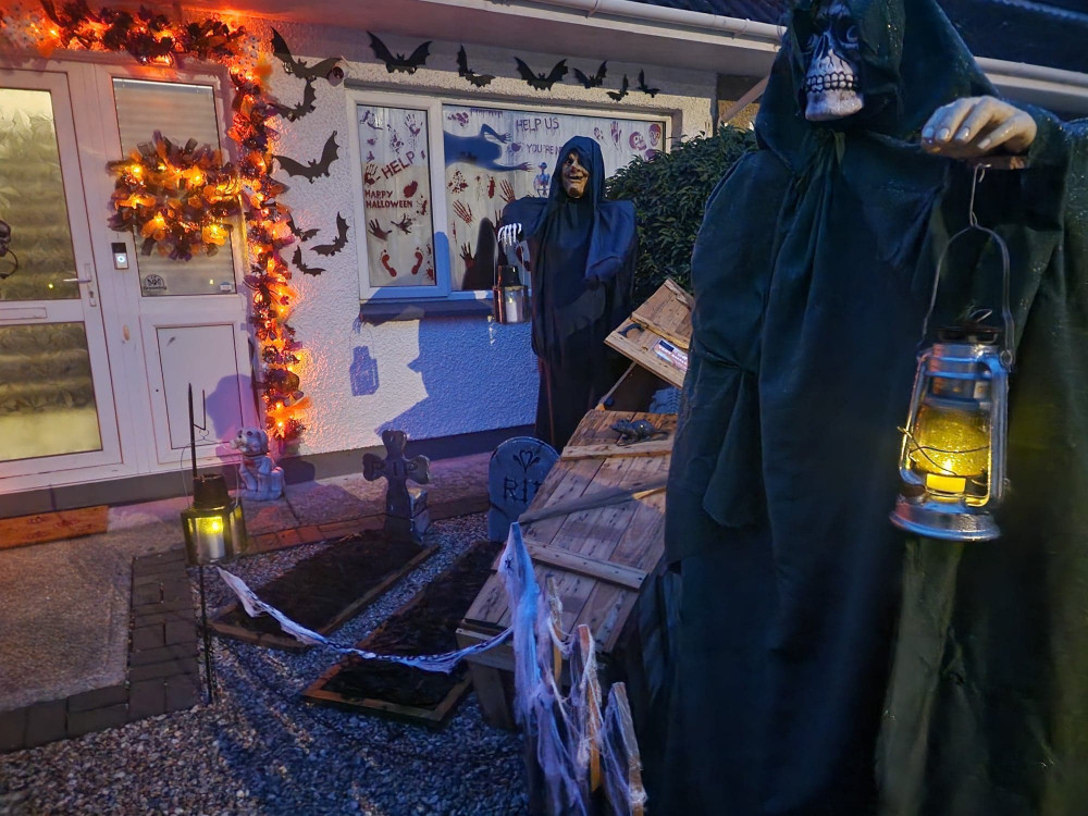 The spooky decorations in the entrance to the garden.