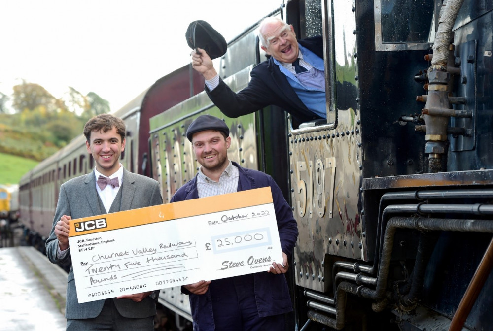 All aboard: (left to right) Churnet Valley Railway Assistant Manager Jack Ilczyszyn, volunteer driver Christopher Simcock and driver Frank Dale celebrate the £25,000 donation from JCB.