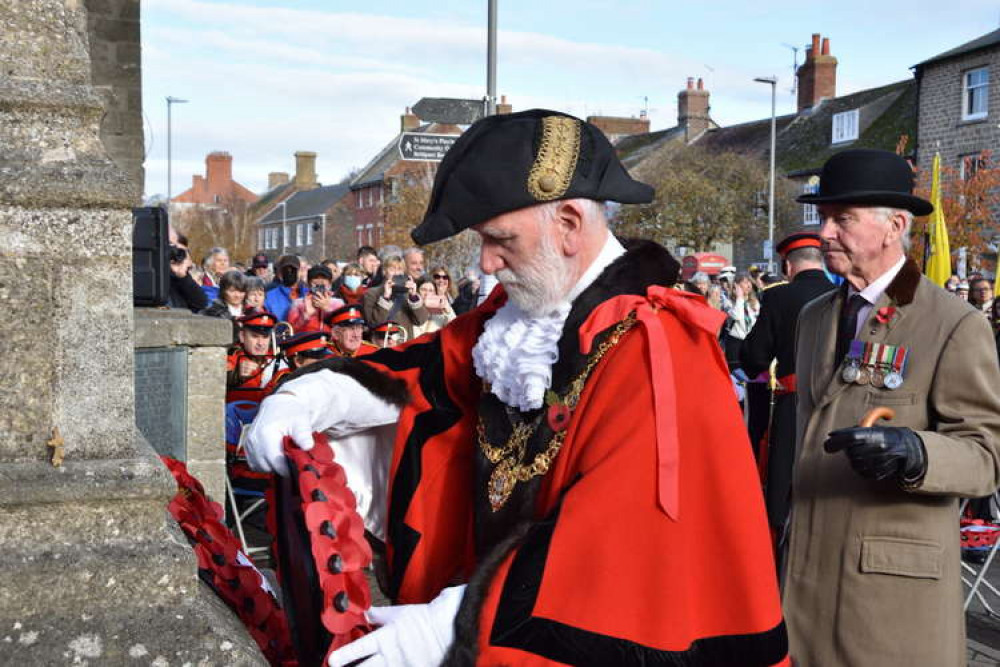 A picture from last year's remembrance service - Mayor Ian Bark lays a wreath.