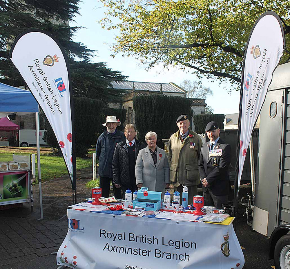 Axminster branch of the Royal British Legion members pictured in Trinity Squarter where they launched the 2022 Poppy Appeal. From the left : secretary the Reverend Geoffrey Walsh, Mr Mervyn Symes, Mrs Jacqui Symes, chairman Mr Peter Slimon and parade marshal Lee Davis