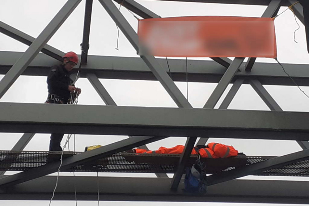 Specialist officers were used to remove a man from the gantry at Junction 27. 