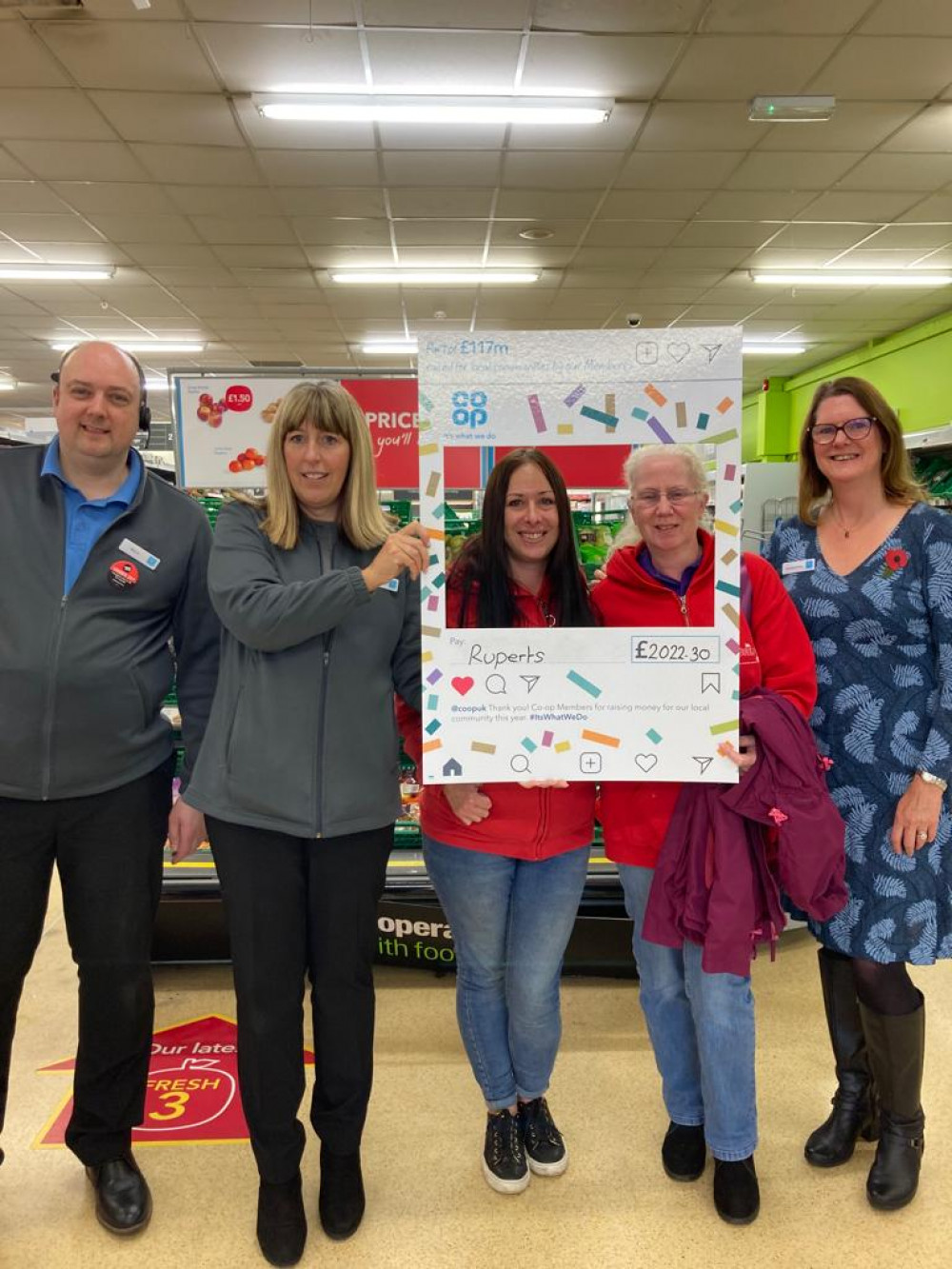 Ruperts Pre-School collect their donation at Co-op