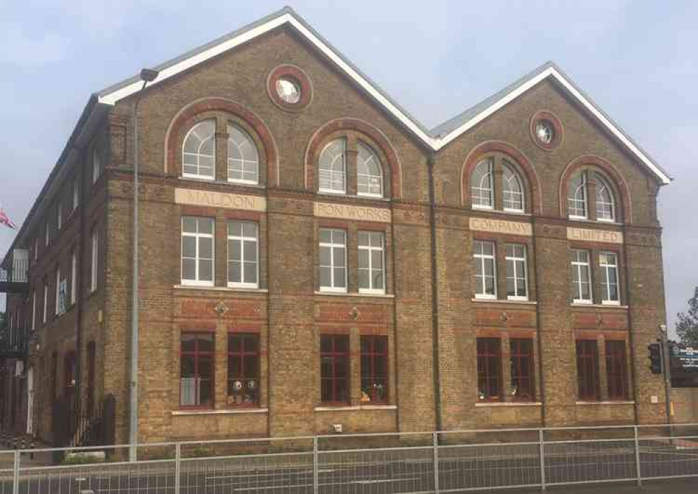 Maldon's Old Iron Works building: the stone is set in the wall, just visible here close to the traffic lights on the right of the picture