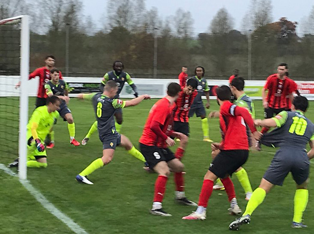 A packed six yard box as Coggeshall attempt to clear their lines. 