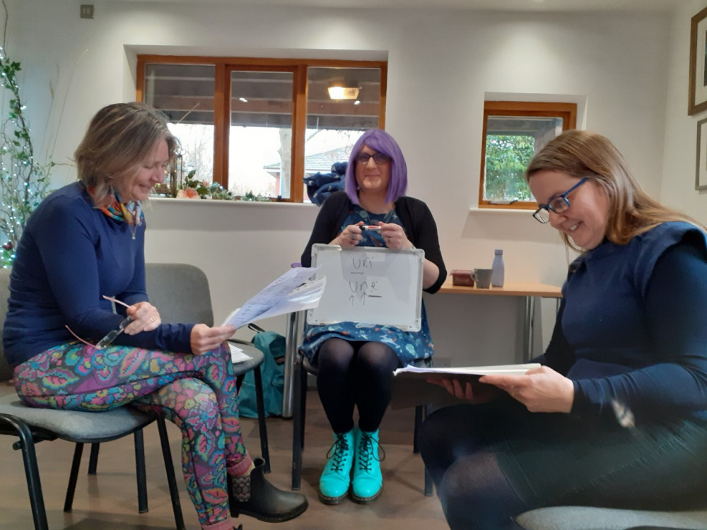 Dany with two students at the Wednesday lunchtime class. 