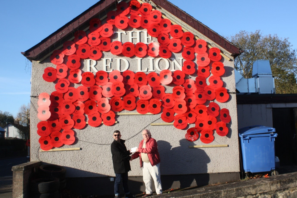 Peter Davies (left) presenting the donation to David Howell Poppy Appeal Organiser