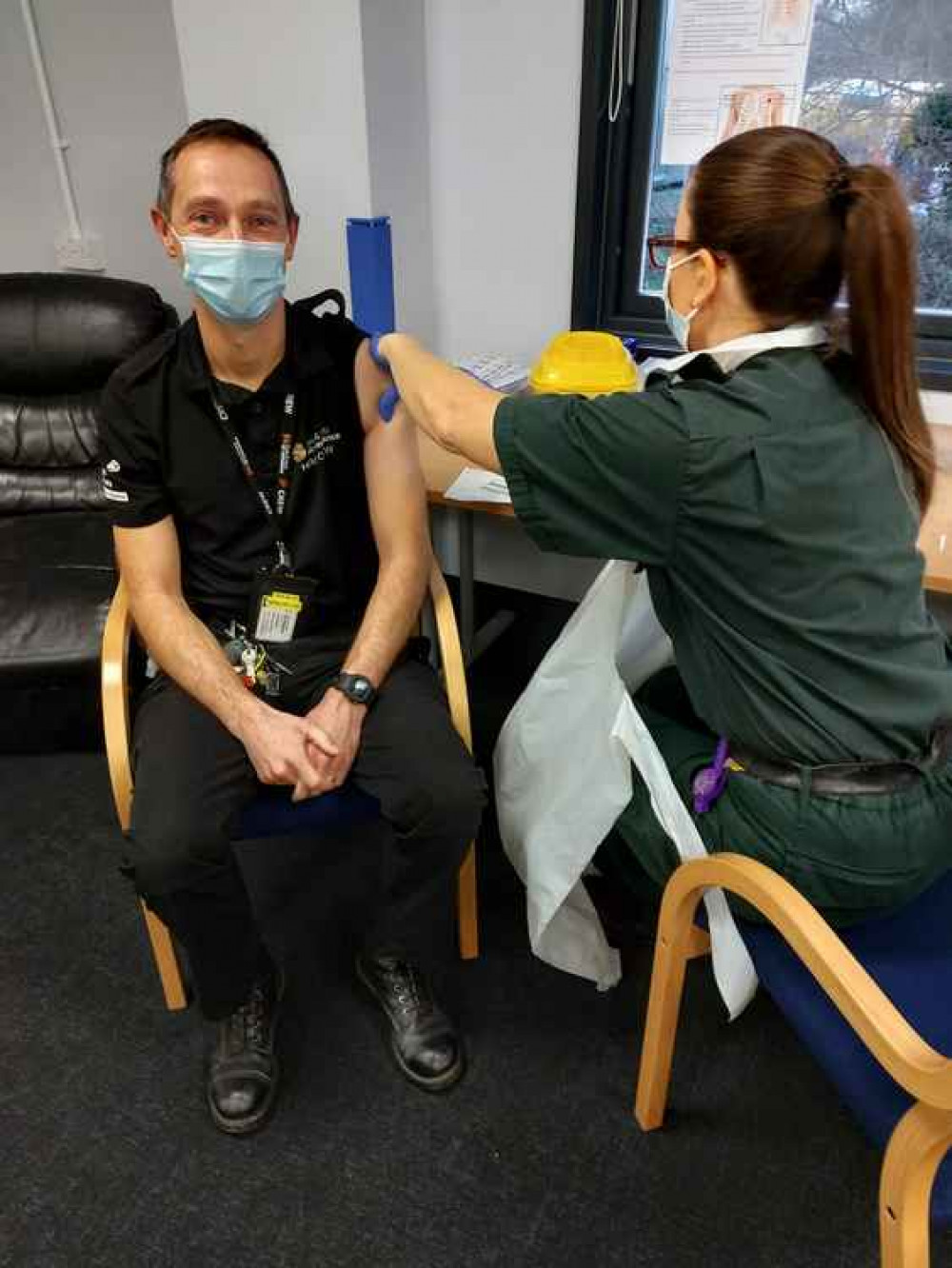 Critical care paramedic Laurie Philipson receives the Covid vaccine