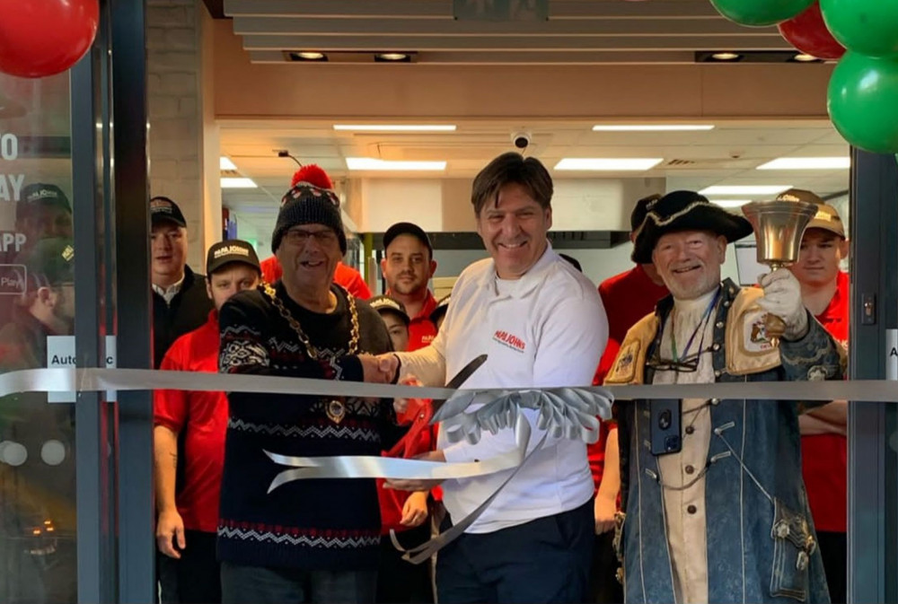 L to R: Mayor of Exmouth Cllr Steve Gazzard, Dr Renato Raho, Town Crier Roger Bourgein (Papa John's)