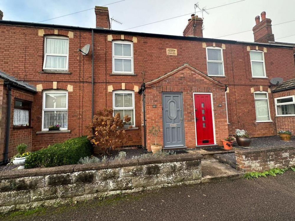The property is a characterful terraced house (image courtesy of Moores Estate Agents). The property is a characterful terraced house (image courtesy of Moores Estate Agents).