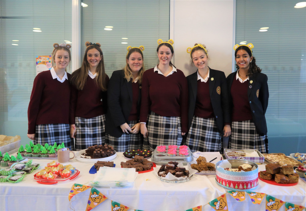 Oakham School pupils hosting a bake sale (image courtesy of Oakham School). Oakham School pupils hosting a bake sale (image courtesy of Oakham School).