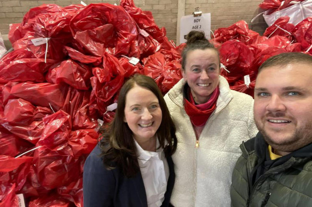 Dee Drake (left) with Toy Appeal volunteers Kirsty and Kieran.