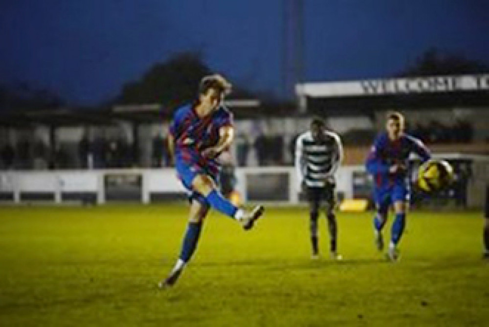 Harry Phillips dispatches the winning penalty.