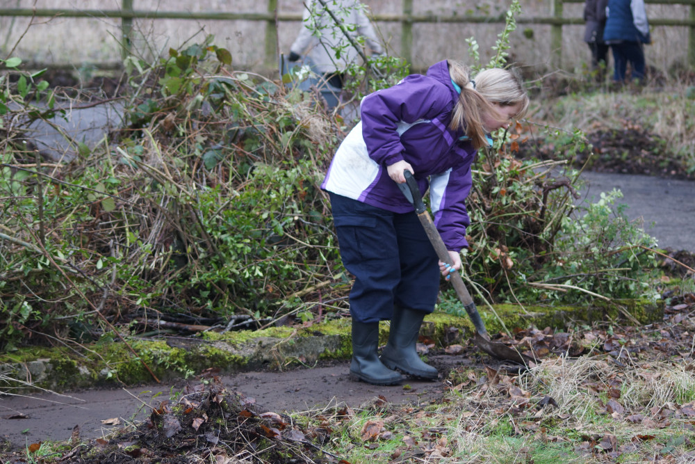Trustee Sarah helped to cut back the overgrown land (Tom Lampard). Trustee Sarah helped to cut back the overgrown land (Tom Lampard).