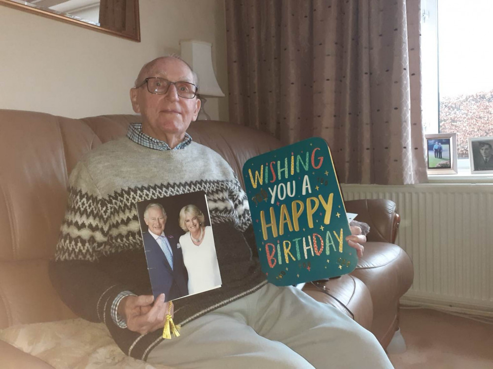 George Court with his birthday cards including one from the King and Queen Consort 