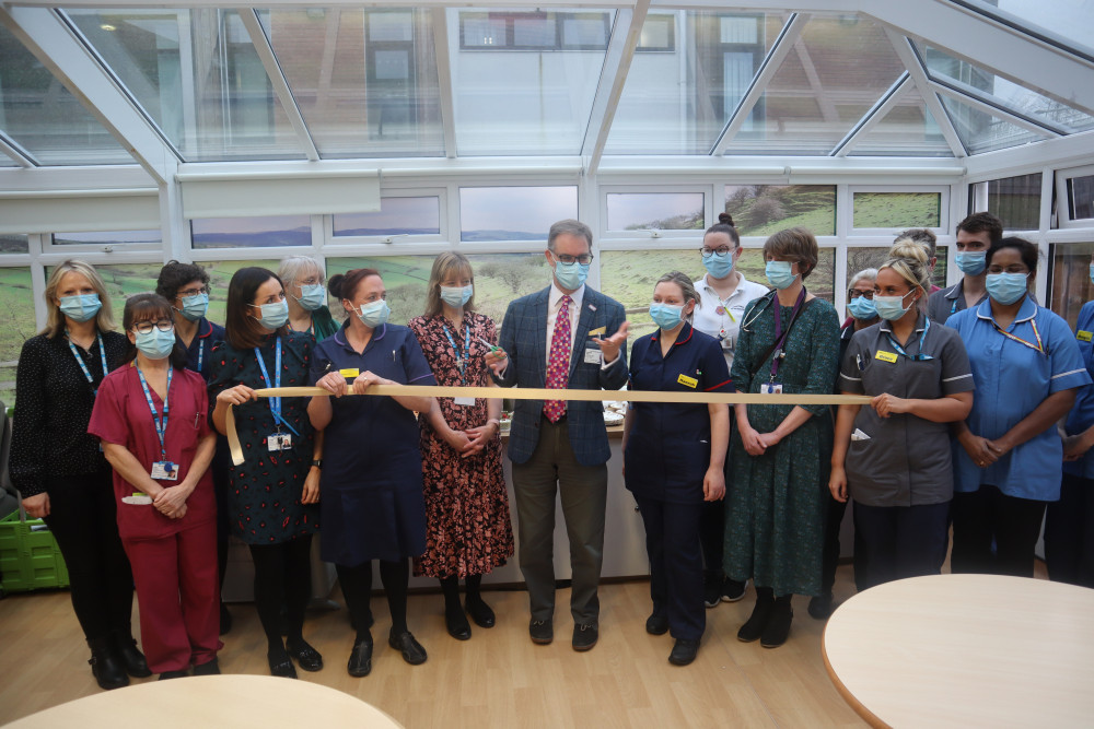 Andrew Smith Acting Chair of Board, Kara Mason Director of Finance and staff celebrate the official launch of the refurbishment. (Image - East Cheshire NHS)