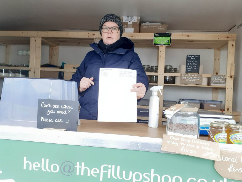  Market trader, Julie Williams, with the petition today. 