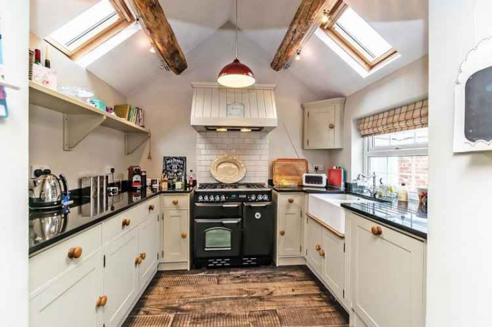 The kitchen boasts attractive exposed beams. Image: Gascoigne Halman Frodsham The kitchen boasts attractive exposed beams. Image: Gascoigne Halman Frodsham