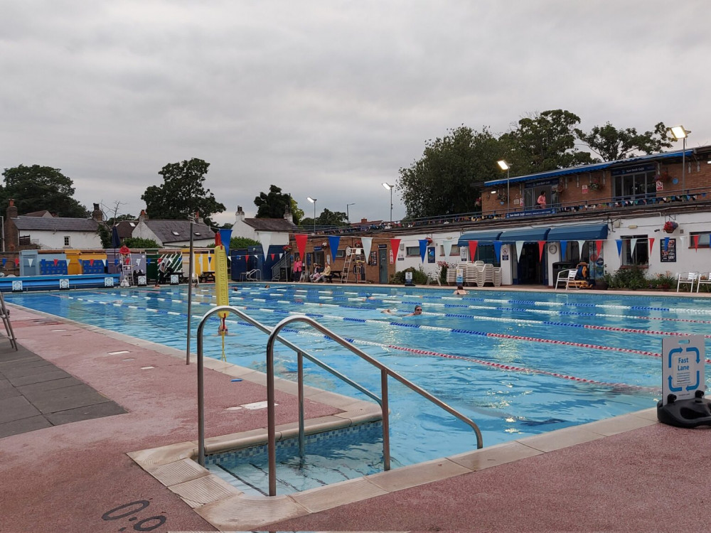 Local MP Munira Wilson, has challenged the government over its failure to include beloved community idols, such as the 100-year-old Hampton Pool, within its list of sectors entitled to greatest support in its newly announced Energy Bills Discount Scheme.