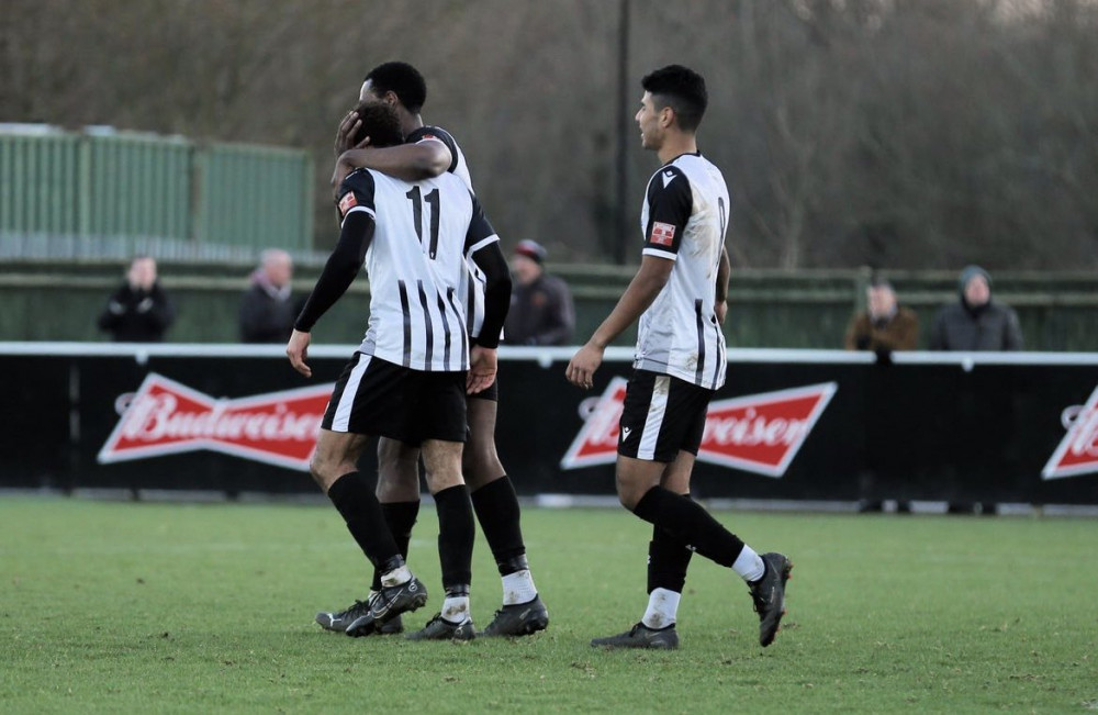 10-man Hanwell Town managed to hold on to claim all three points against Tiverton Town. Photo: Hanwell Town.