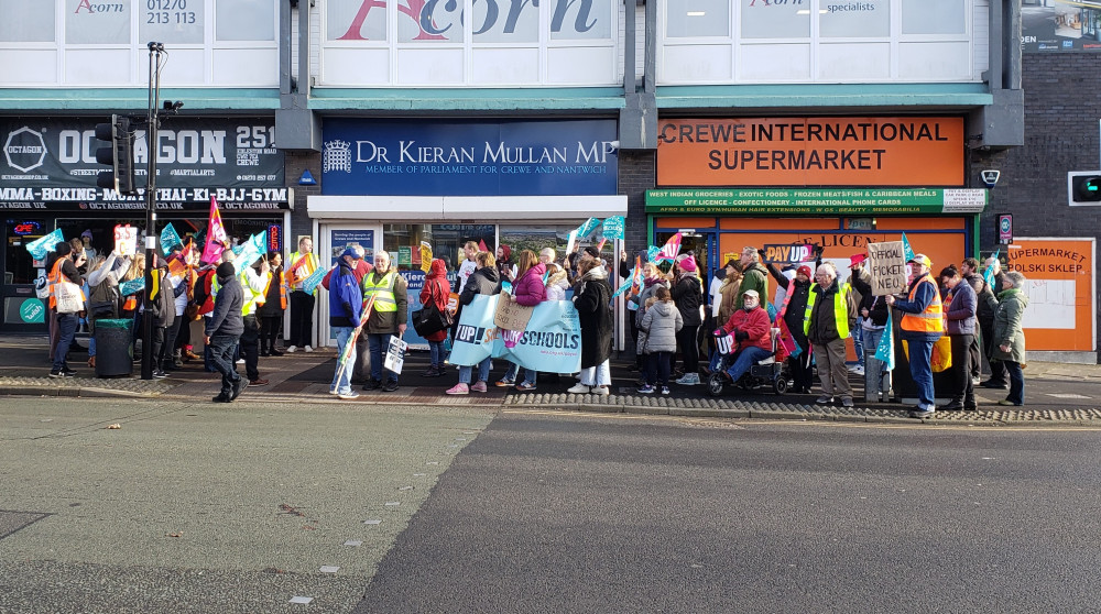 Dozens of teachers and supporters from across Cheshire East marched from Crewe Railway Station to Dr Kieran Mullan MP's office on Wednesday 1 February (LDRS). Dozens of teachers and supporters from across Cheshire East marched from Crewe Railway Station to Dr Kieran Mullan MP's office on Wednesday 1 February (LDRS).