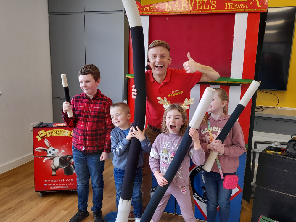 Thea, Lloyd, Alfie and Emily with their magic wands.