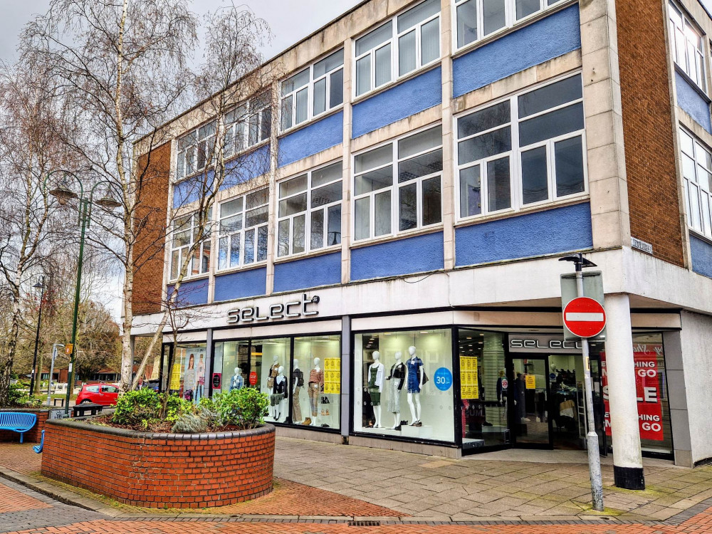 Select Fashion, Earle Street, placed closing down signs in its shop windows on Wednesday 22 February (Ryan Parker).