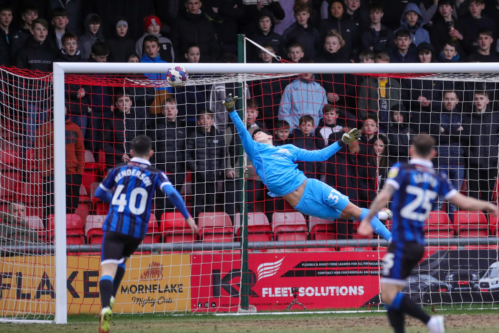 James Beadle produced a breath-taking save to thwart Rochdale's Owen Dodgson early on (Picture credit: Kevin Warburton).