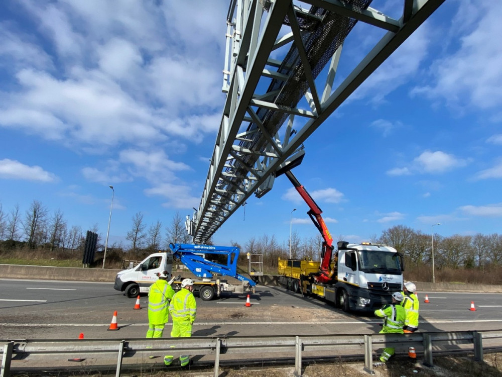 Work taking place to remove signage from the M5 gantry yesterday Work taking place to remove signage from the M5 gantry yesterday