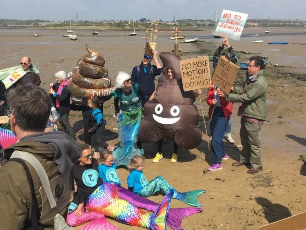 Wild swimmers protest before dip in Stour (Picture: Mermaids Against Sewage)