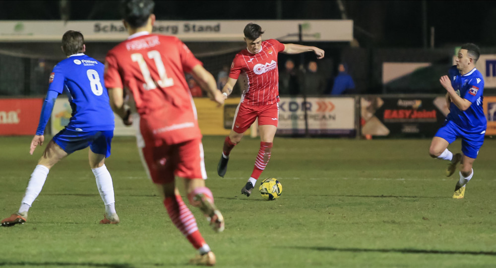 Joe Whight (Red with ball), who was later sent off (Picture: Stefan Peck) Joe Whight (Red with ball), who was later sent off (Picture: Stefan Peck)
