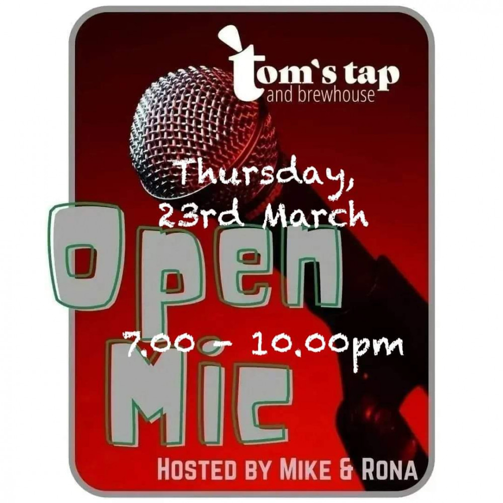 Open Mic at Tom's tap. Open Mic at Tom's tap.