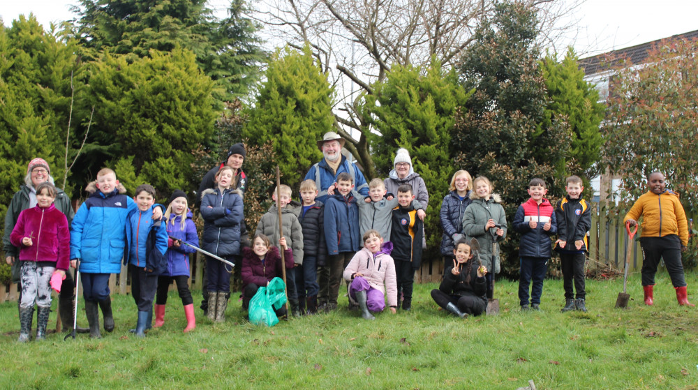 Back row: Staff member Eva Robinshaw of Macclesfield's Bollinbrook Primary School, Paul McCandless of Macclesfield Community Tree Nursery, Cllr David Edwardes, Case Worker Emma Gilman, Front row: Children of Bollinbrook Primary School 