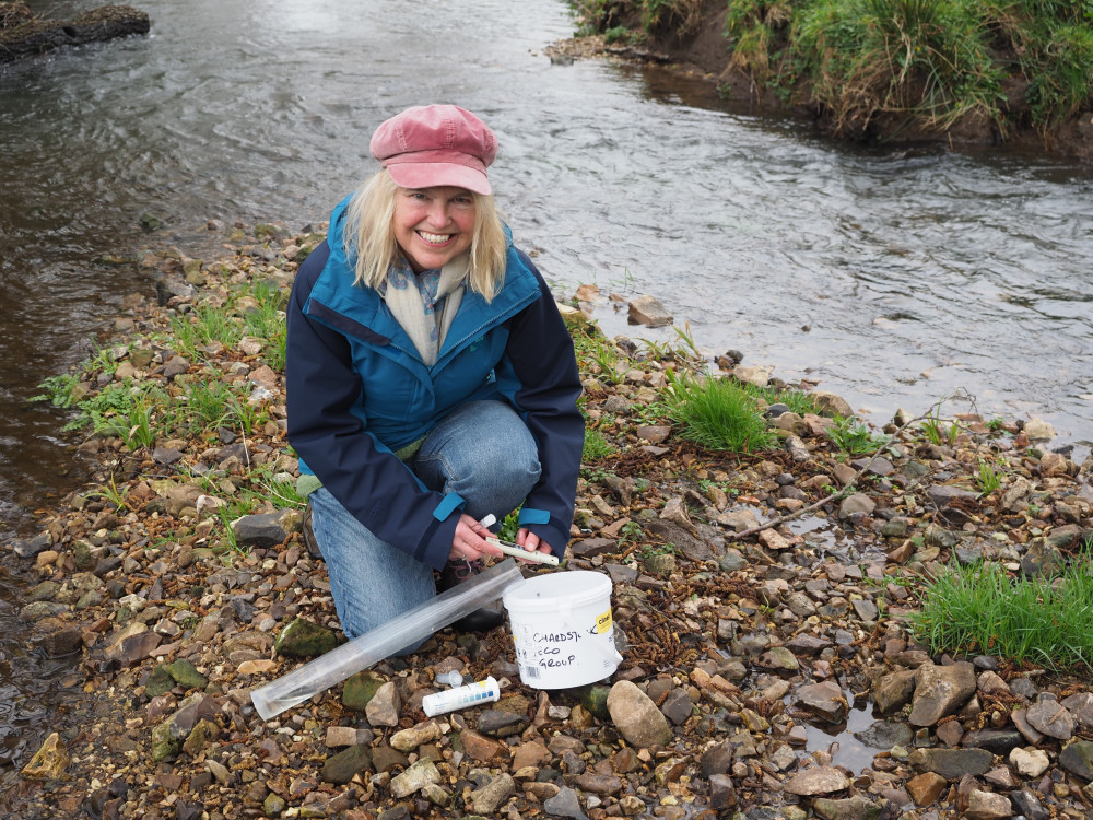 Vicky Whitworth of Chardstock gets ready to test the water quality at Kit Brook