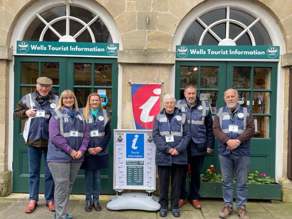 Back to work: Wells Ambassadors gather outside the Tourist Information Centre at the Town Hall 