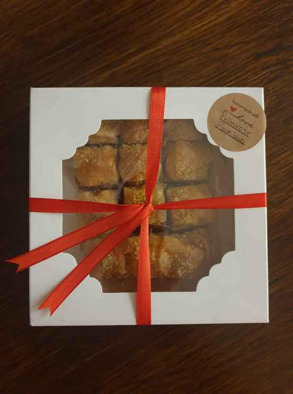 Maryam delivers her boxes of baklava on Fridays Maryam delivers her boxes of baklava on Fridays