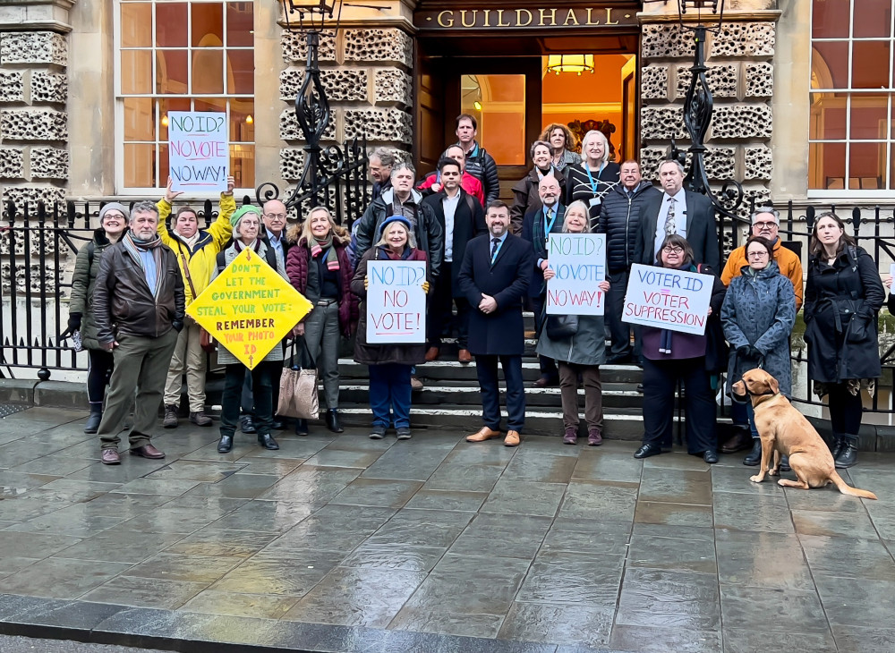 ouncil leader Kevin Guy (center) and other councillors with protestors outside the Guildhall on Thursday (Image: Clive Dellard) - free to use for all partners, 
