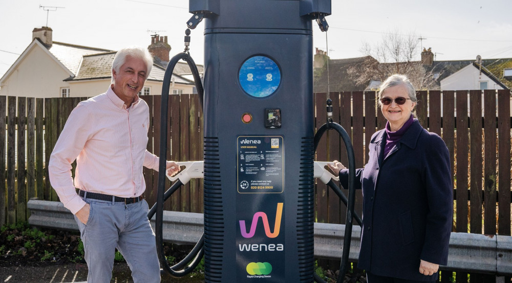 Jose Contreras of Wenea and Cllr Marianne Rixson with new EV charger (EDDC)