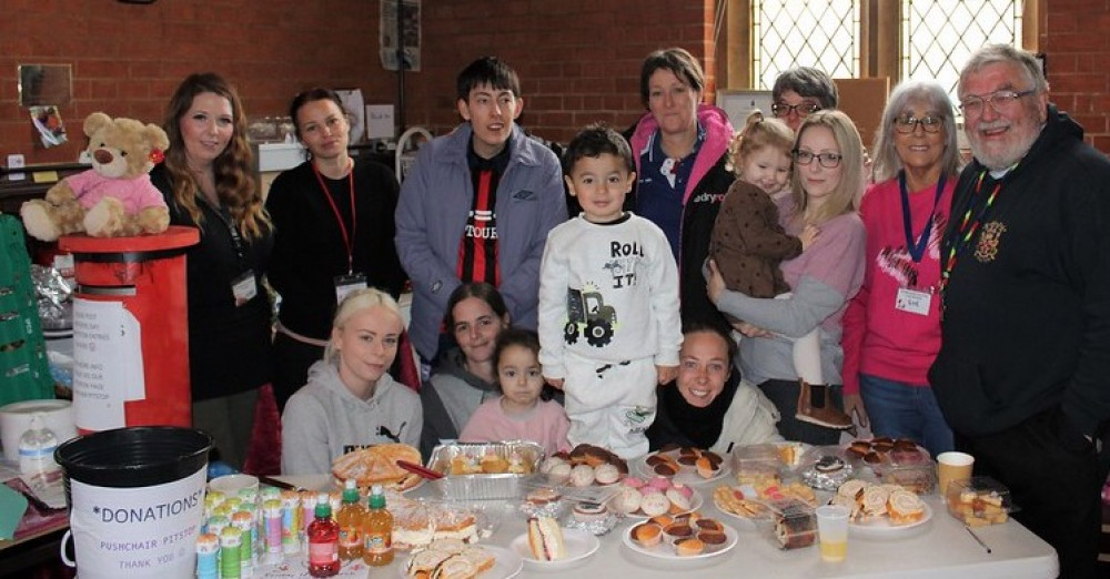 Andrew Dotchin (far right) with Pushchair Pitstop volunteers (Picture: Diocese of St Edmundsbury and Ipswich)