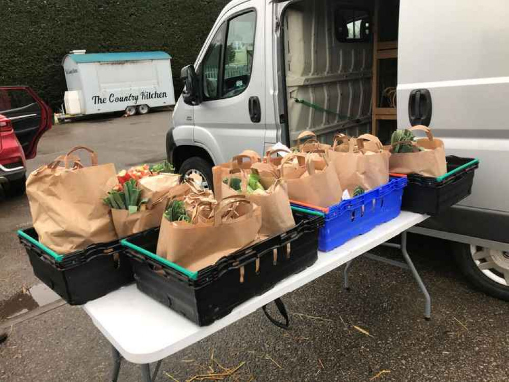 At The Food Collective drive through, where your order is placed in your car boot