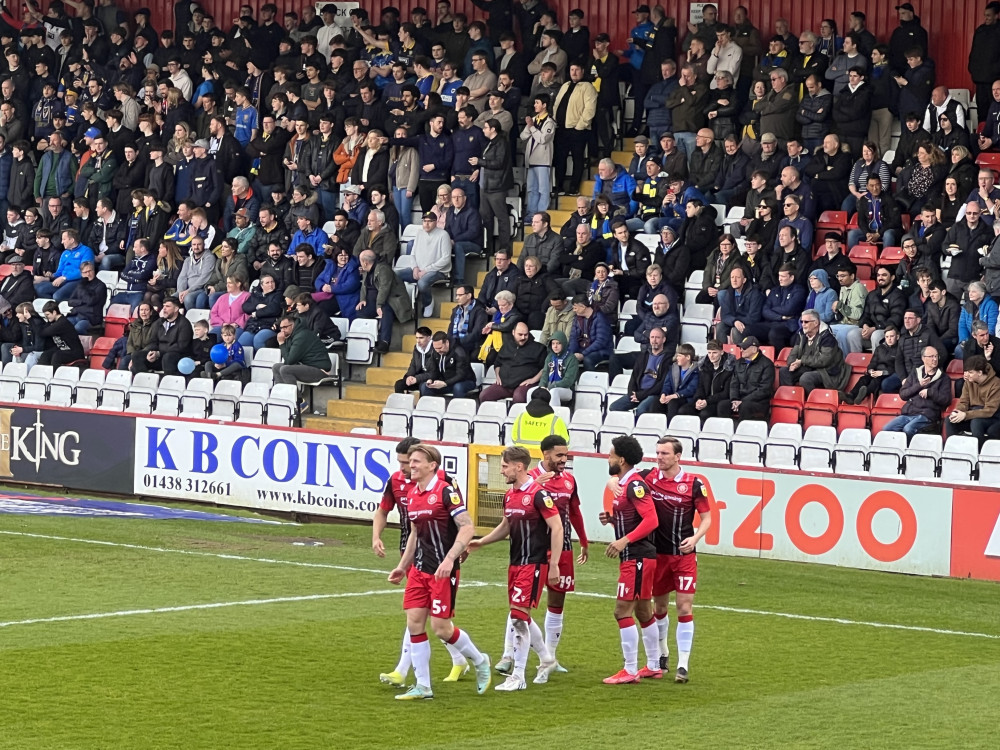 Stevenage 2-1 AFC Wimbledon. PICTURE: The Stevenage side celebrate Jordan Roberts opener for the home side. CREDIT: @laythy29