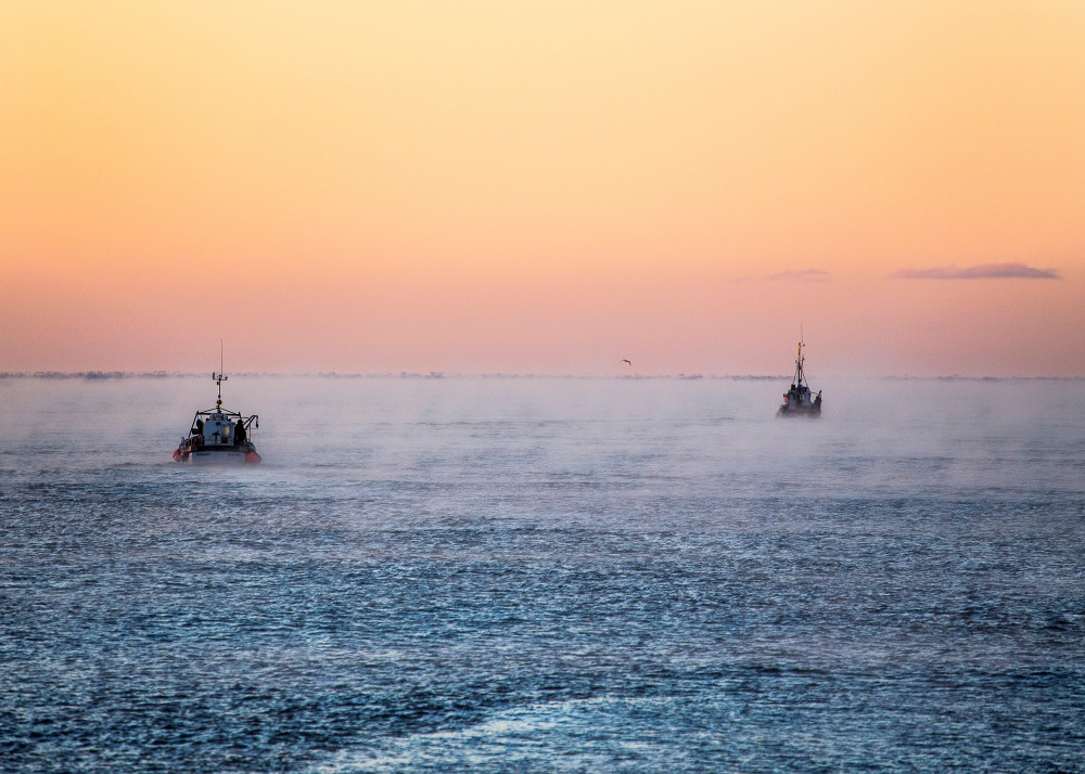 Fishing boats heading out (credit Neil Barnes)