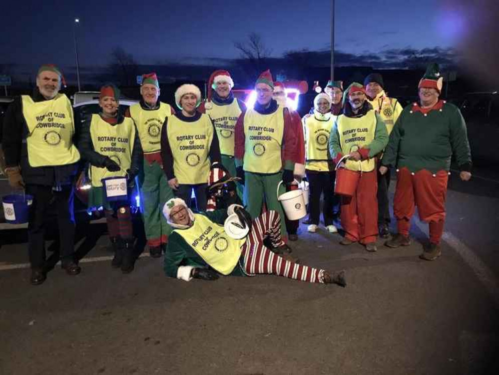 Santa's elves work hard to make sure he can tour the town (this photo was taken before the Coronavirus pandemic)