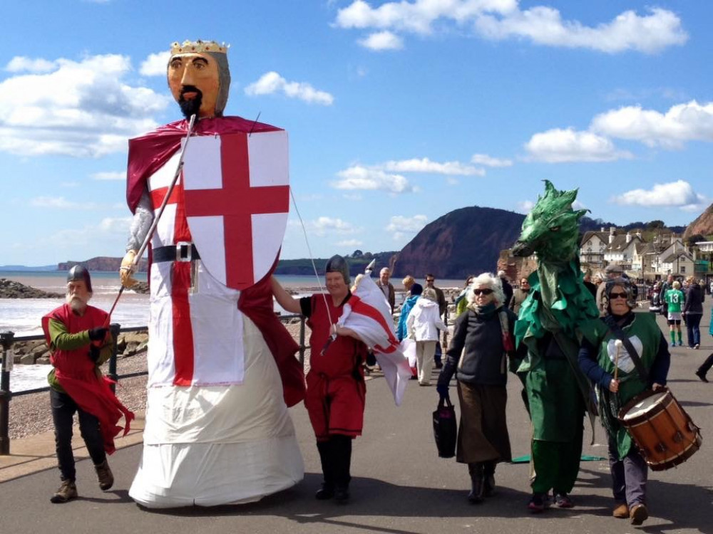 'Giants' on Sidmouth seafront for St George's Day (Sidmouth Steppers)