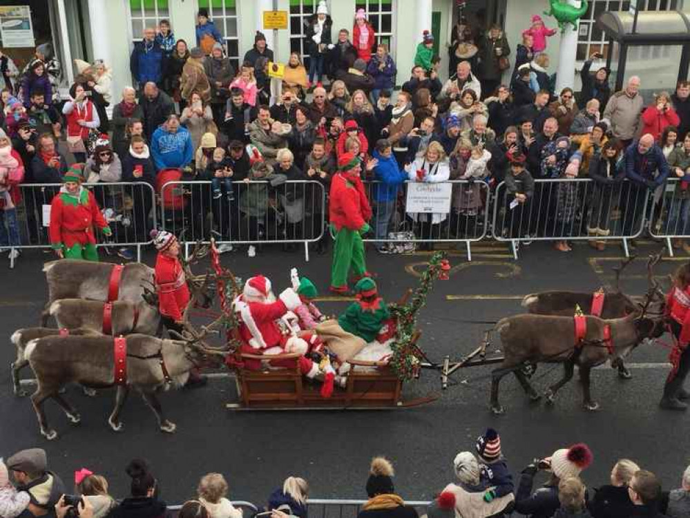 Santa and his reindeer parade through Cowbridge